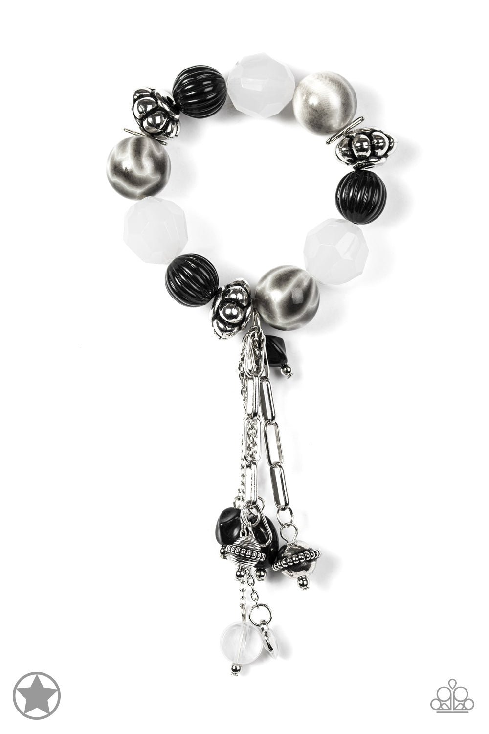 Dainty black beads nestled among beautiful silver and white pieces along a stretchy band. Dangling charms add a dramatic effect.