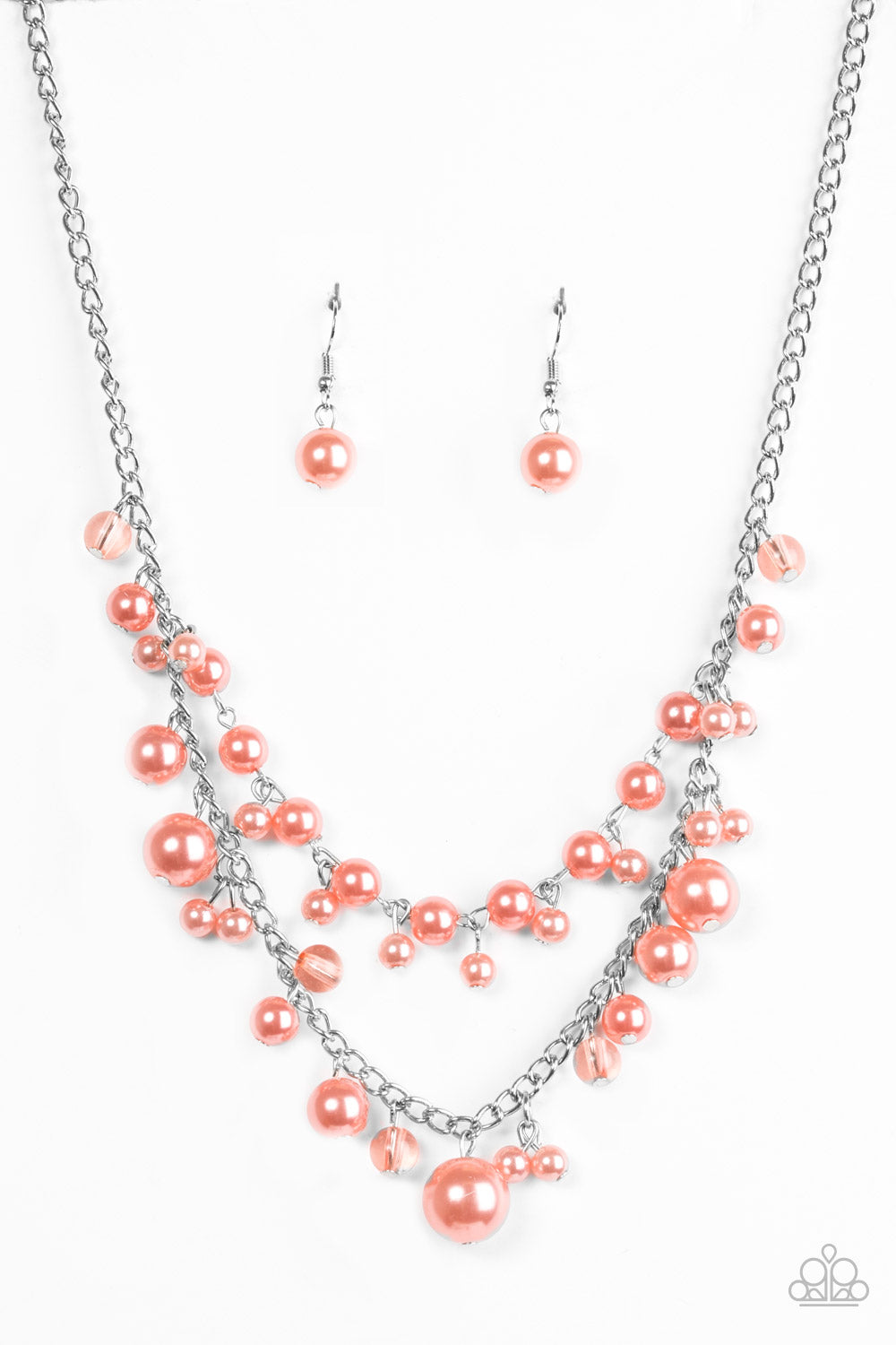 Featuring glassy and pearly finishes, dainty coral beads swing from the bottom of layered silver chains, creating a bubbly fringe below the collar. Features an adjustable clasp closure.