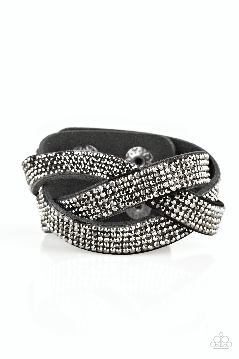 Encrusted in row after row of glittery hematite rhinestones, three black suede bands braid across the wrist for a sassy look. Features an adjustable snap closure.