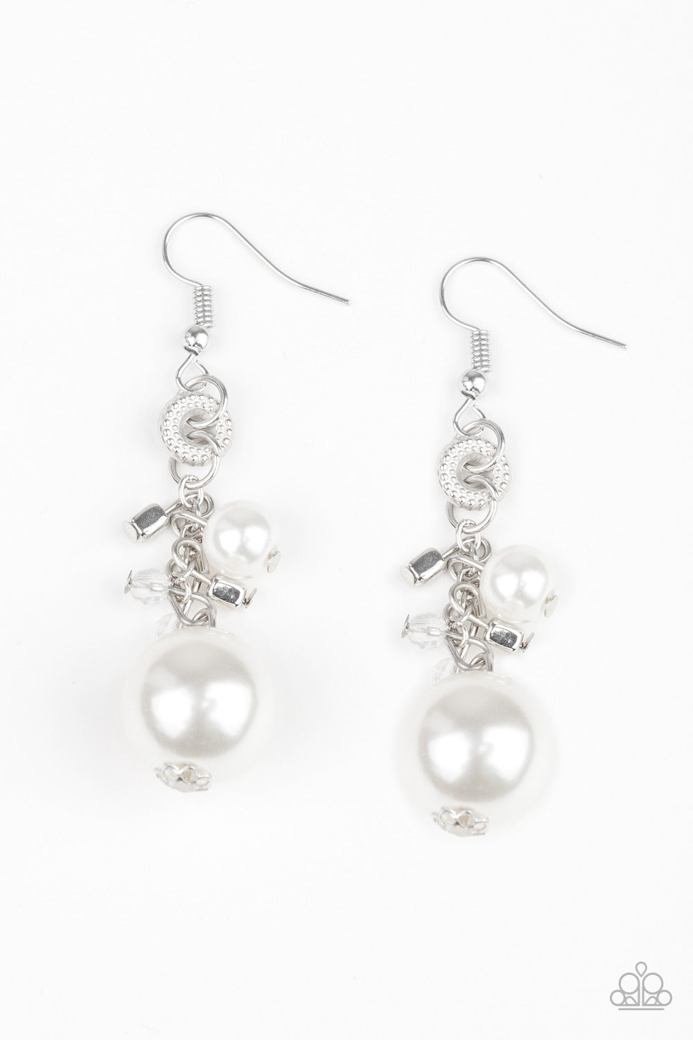 A bubbly white pearl, glassy crystal-like beads, and shimmery silver cube beads trickle along a glistening silver chain. An oversized white pearl swings from the bottom of the chain, creating a dramatic lure. Earring attaches to a standard fishhook fitting.