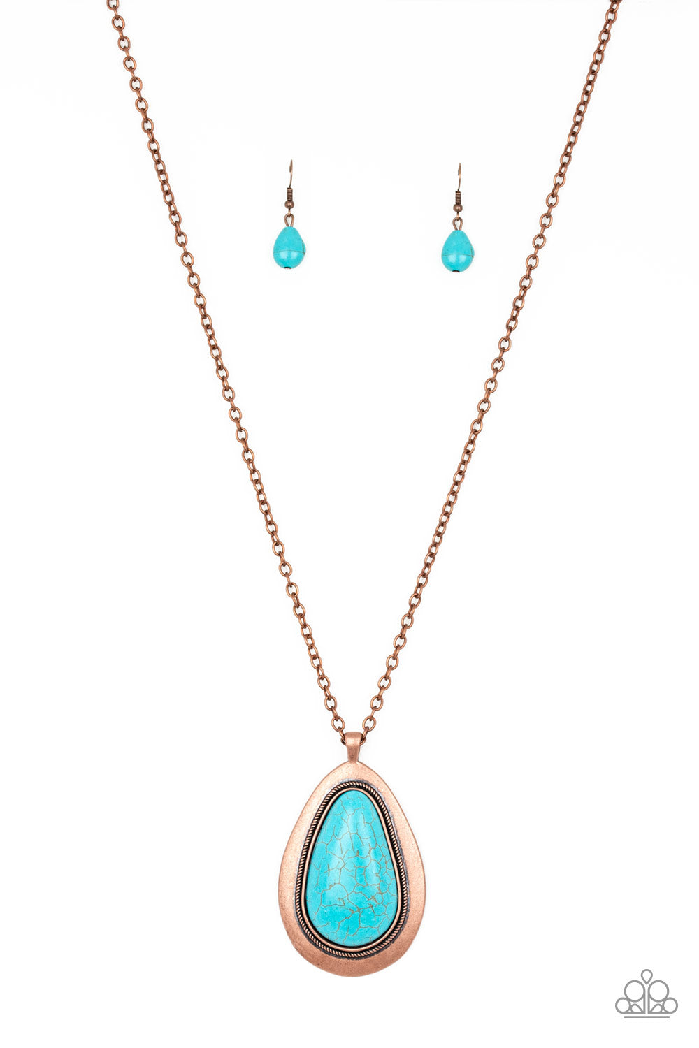 A dramatic turquoise stone teardrop is pressed into a glistening copper frame radiating with rustic patterns. The impressive pendant swings from the bottom of a lengthened copper chain for a seasonal look. Features an adjustable clasp closure.