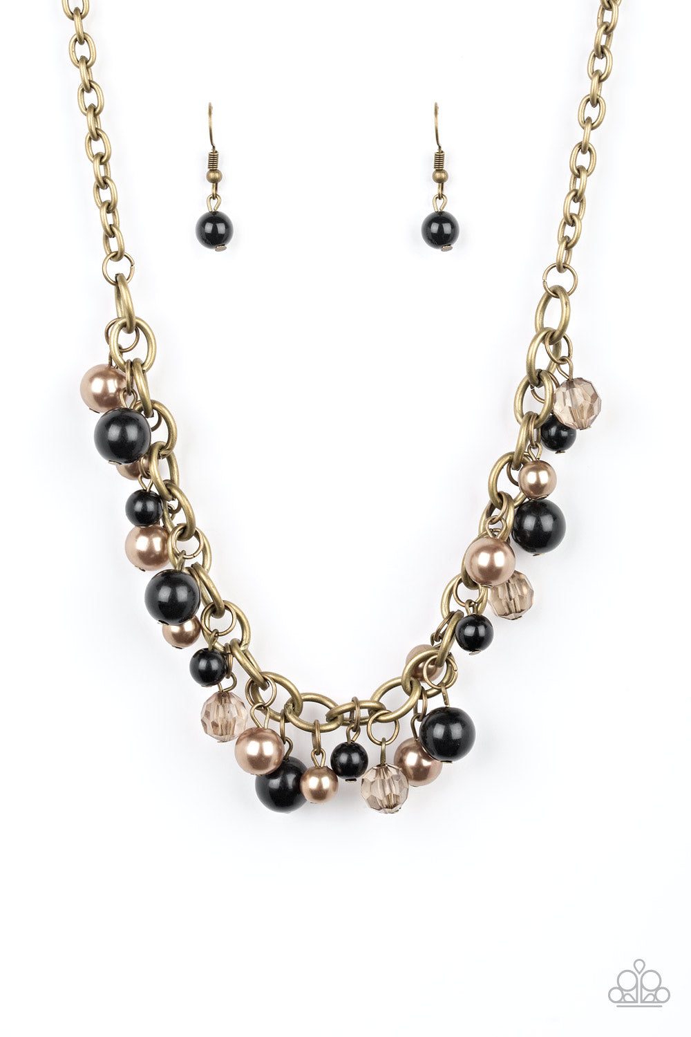 Pearly brass, polished black, and glittery crystal-like beads swing from a bold brass chain, creating a refined fringe below the collar. Features an adjustable clasp closure.