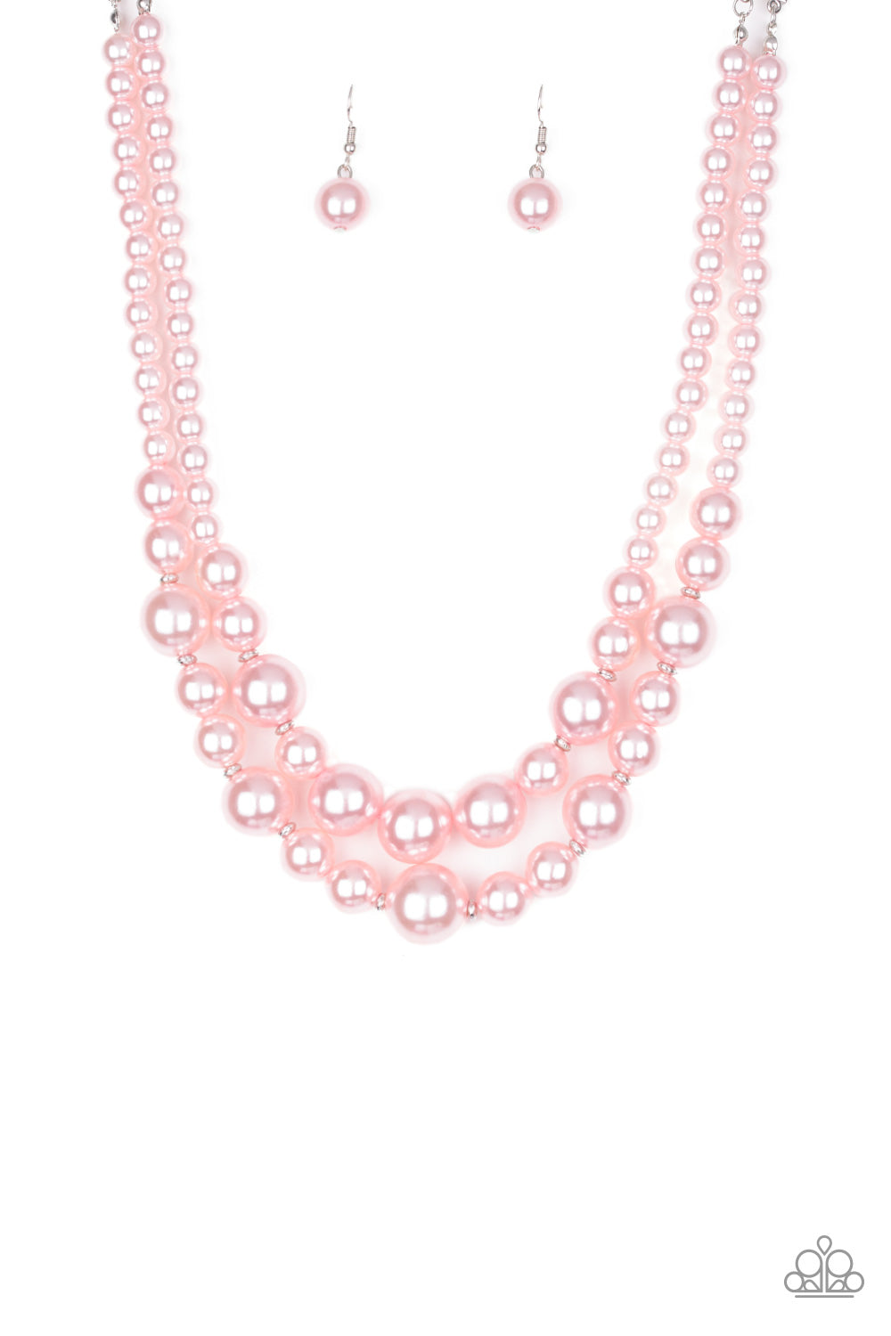 Infused with dainty silver accents, classic pink pearls layer below the collar in a timeless fashion. Features an adjustable clasp closure.