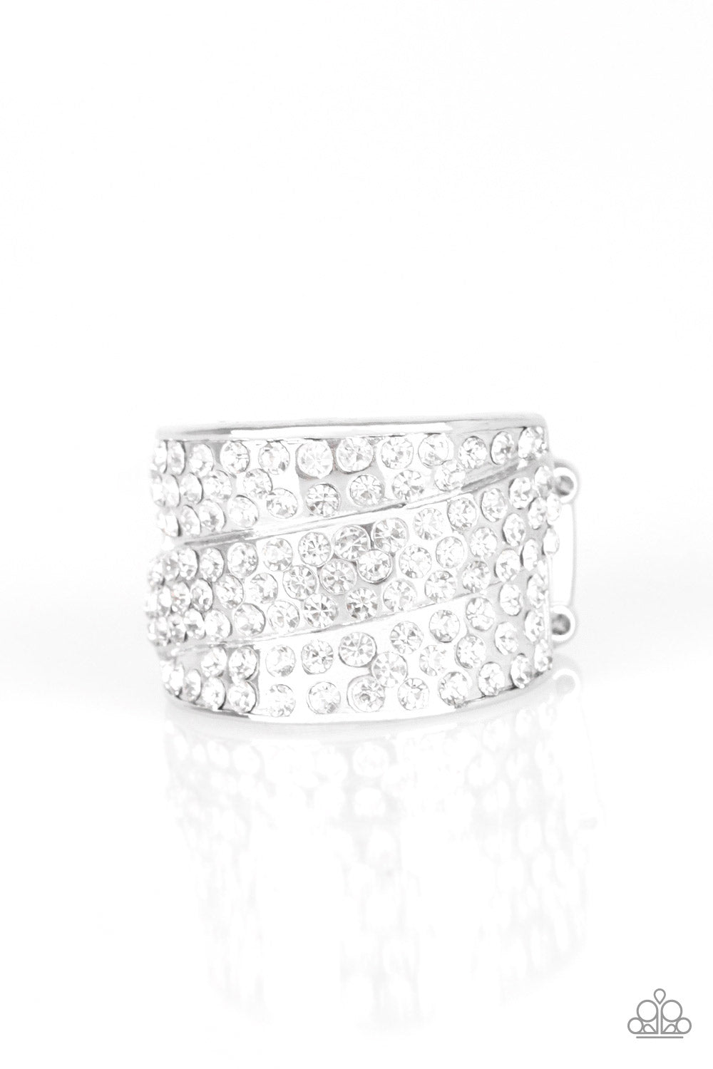 Row upon row of glistening white rhinestones stack into an incandescent display. An additional row of sparkling rhinestones wraps diagonally across the band for an extra splash of refined shimmer. Features a stretchy band for a flexible fit.