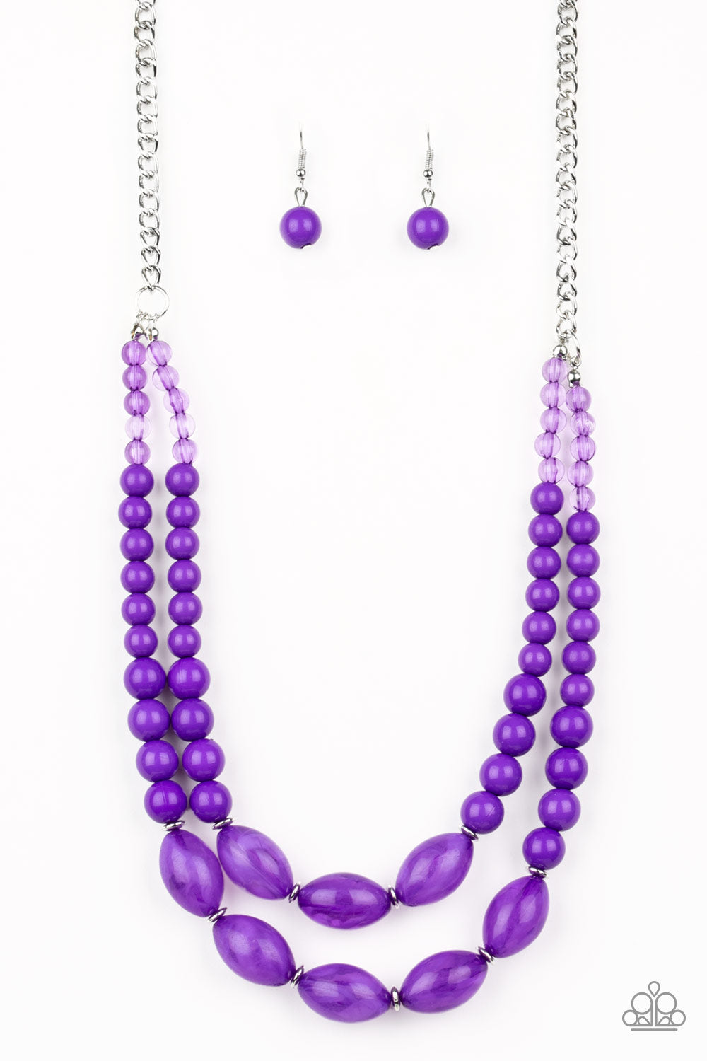 A collection of glassy, polished, and cloudy purple beads are threaded along two invisible wires below the collar for a beautiful pop of color. Features an adjustable clasp closure.