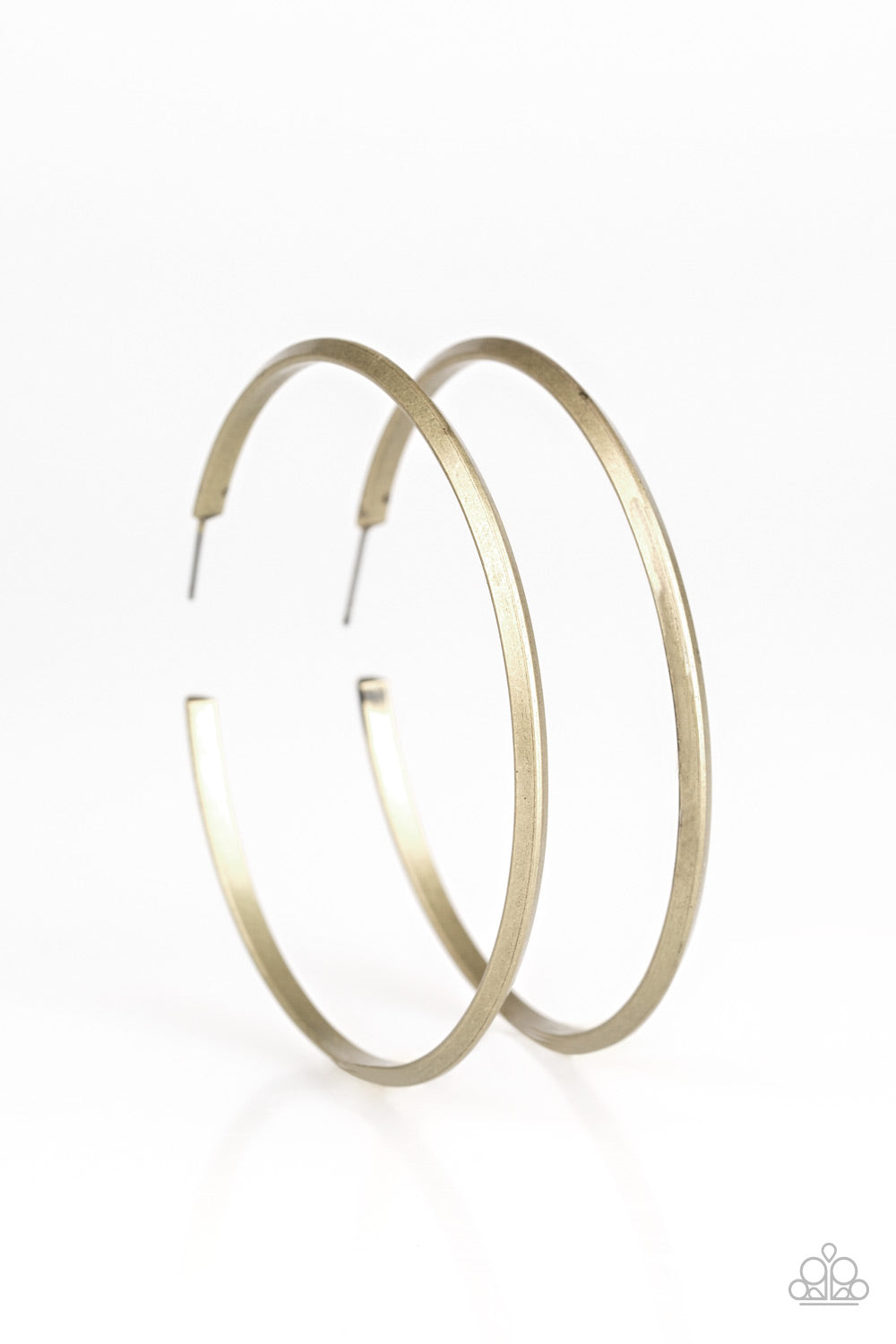 Brushed in an antiqued shimmer, a glistening brass bar curls into a sleek hoop for a classic look. Earring attaches to a standard post fitting. Hoop measures 2 1/2" in diameter.