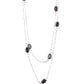 Glassy black beads are threaded along metallic rods, allowing them to spin inside their silver fittings. The colorful frames trickle along two shimmery chains across the chest for a refined layered look. Features an adjustable clasp closure.