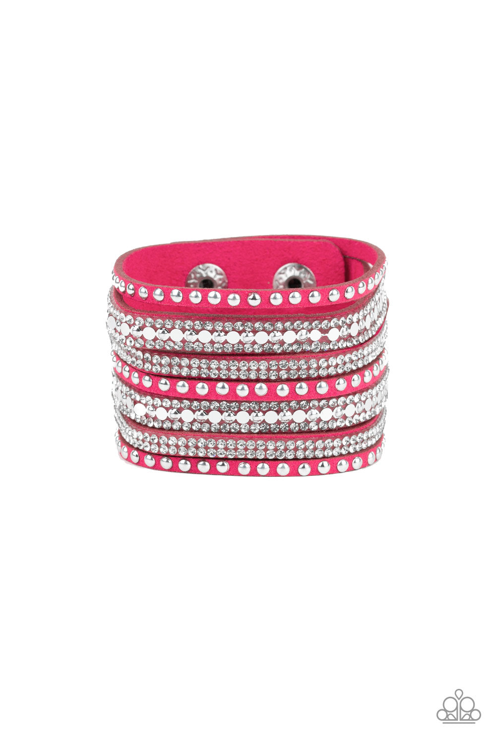 A thick pink suede band has been spliced into glittery strands encrusted in a collection of dainty silver studs, glittery white rhinestones, and flat silver sequins for a sassy look. Features an adjustable snap closure