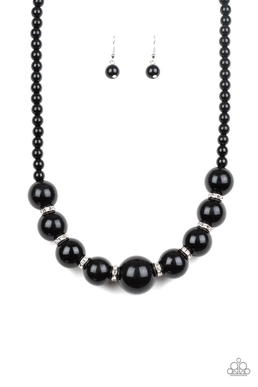 Threaded along an invisible wire, classic black beads give way to an alternating collection of oversized black beads and white rhinestone encrusted rings below the collar for a timeless sparkle. Features an adjustable clasp closure.