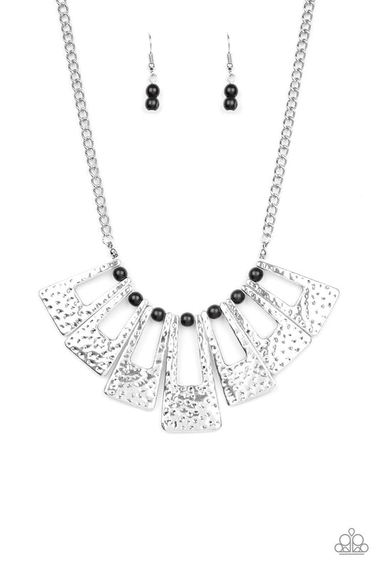 Infused with dainty black stone beads, hammered silver rectangular frames fan out below the collar for a bold seasonal look. Features an adjustable clasp closure.