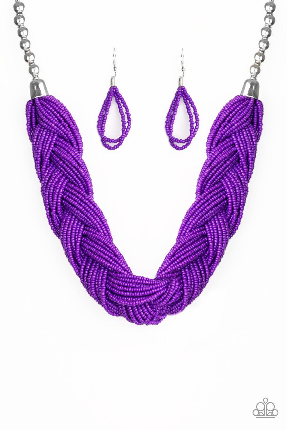 Brushed in a vivacious purple hue, countless seed beads weave into an indigenous braid below the collar. The colorful strands attach to large silver beads, adding a hint of metallic shimmer to the playful design. Features an adjustable clasp closure.
