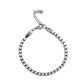 A thick strand of glistening gunmetal box chain links around the wrist for a bold look. Features an adjustable clasp closure.