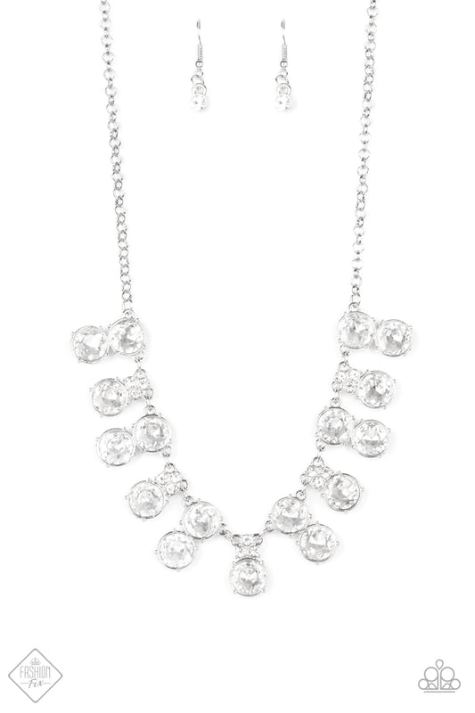 Pairs of stacked white rhinestone frames alternate with solitaire white rhinestones along a shiny silver chain, creating a glamorous fringe below the collar. A cluster of tiny rhinestones sits at the top of each solitaire, resulting in sparkle that just won't quit. Features an adjustable clasp closure.