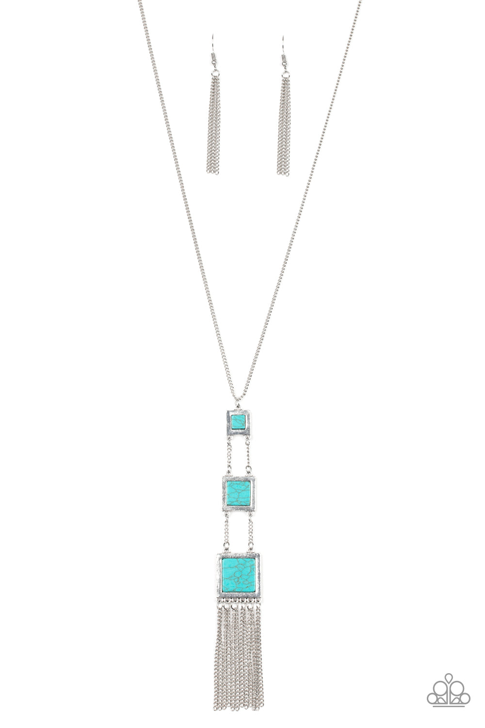 Square silver frames featuring turquoise stone centers, gradually increase in size as they link down the chest. Shimmery silver chains stream from the bottom, adding movement to the seasonal piece. Features an adjustable clasp closure.