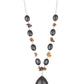 Earthy black stones join bits of tiger's eye rock along a silver chain below the collar. Featuring a studded silver frame, an oversized black teardrop stone pendant swings from the center for a statement-making finish. Features an adjustable clasp closure.