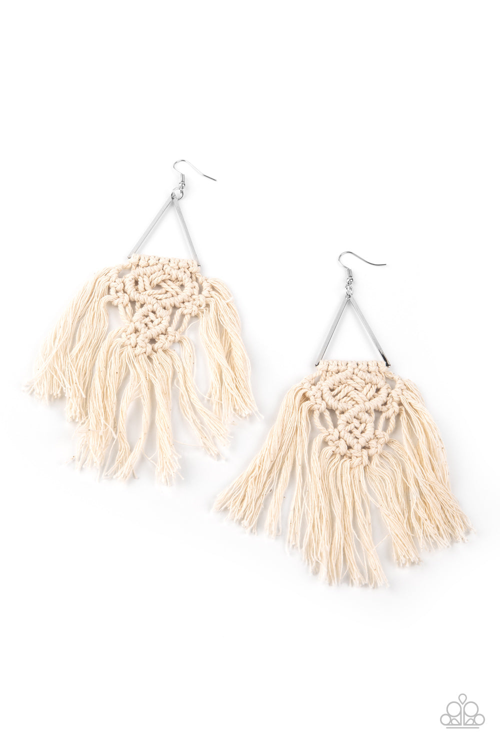 White threaded tassels ornately knot at the bottom of a shimmery silver triangular frame, creating a macramé inspired fringe. Earring attaches to a standard fishhook fitting.