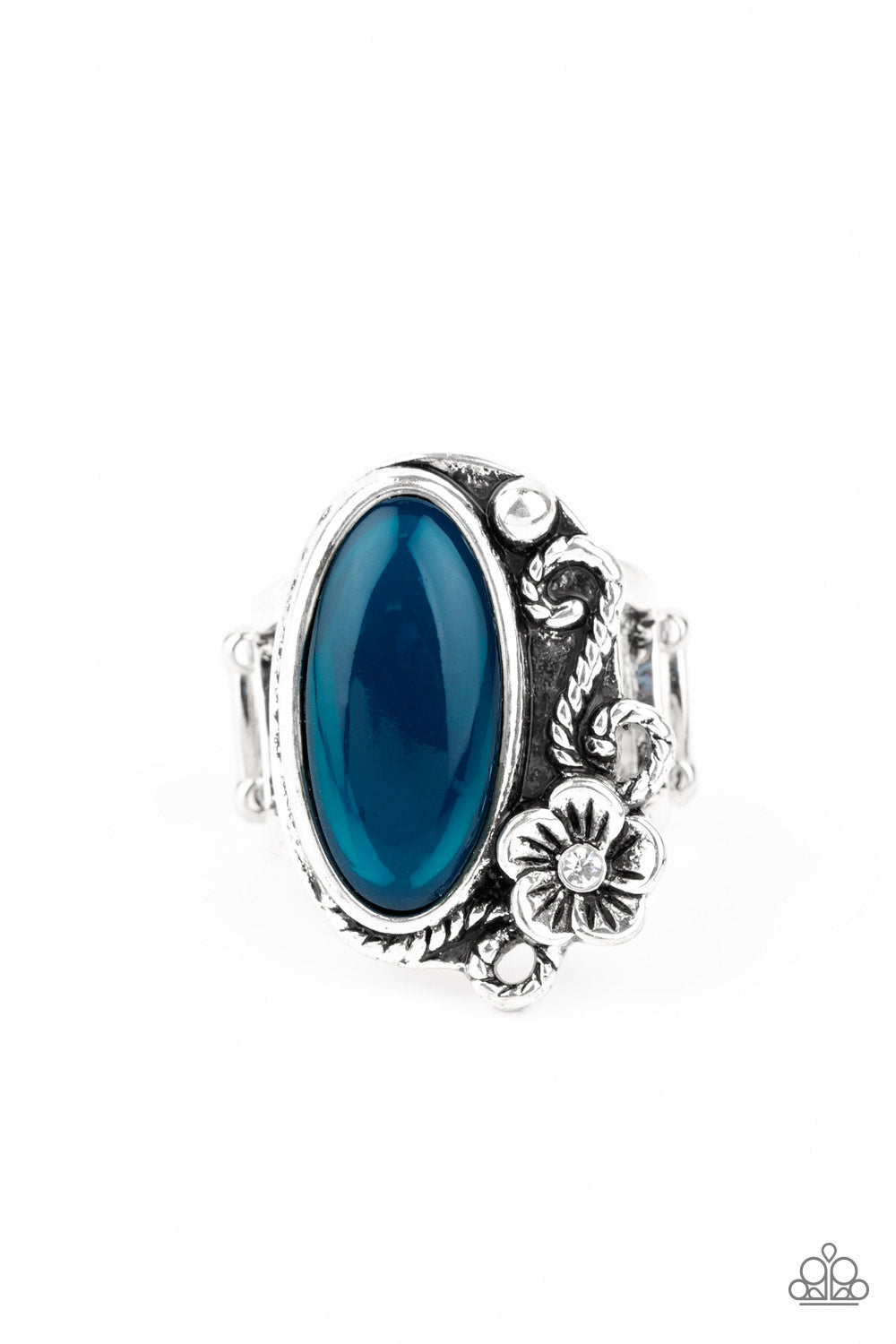Dotted with a dainty white rhinestone center, a leafy floral frame climbs the side of a glassy blue bead for an enchanted look. Features a stretchy band for a flexible fit.  Sold as one individual ring.