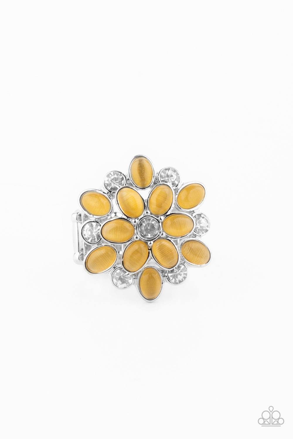Layers of glassy white rhinestones and glowing yellow cat's eye stone petals stack into a whimsically colorful floral centerpiece atop the finger. Features a stretchy band for a flexible fit.