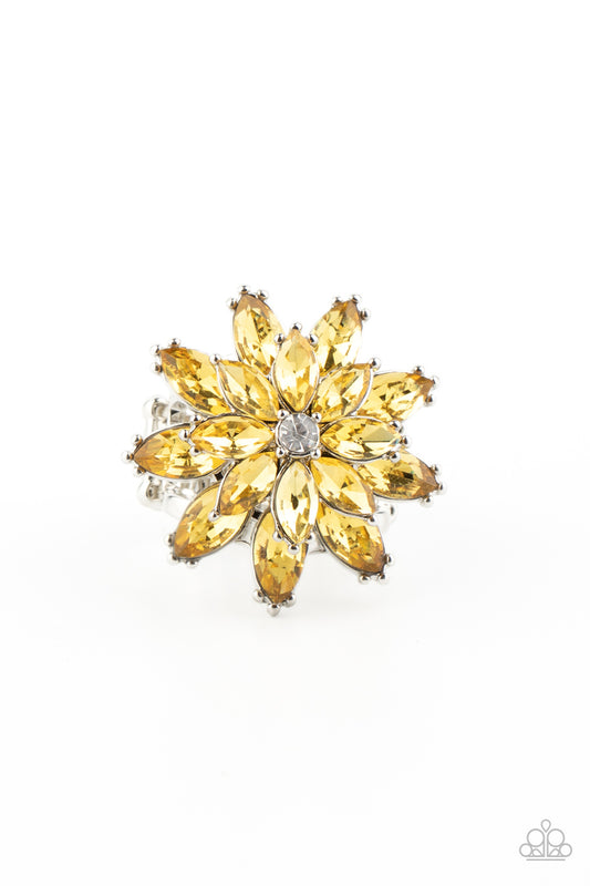 Golden yellow rhinestone petals stack into a glamorous floral frame atop the finger, creating a blinding centerpiece. Features an adjustable clasp closure.  Sold as one individual ring.