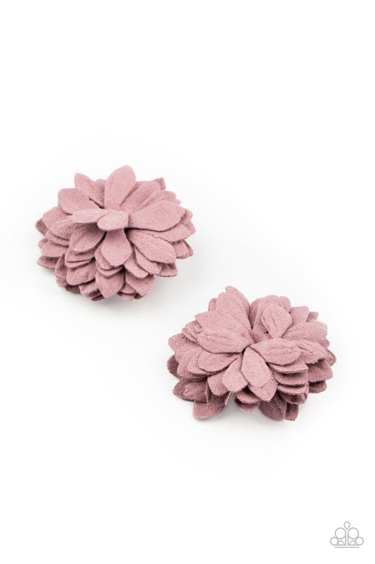 Purple paper-like petals delicately gather into a pair of dainty blossoms for a whimsical look. Each flower features a standard hair clip on the back.