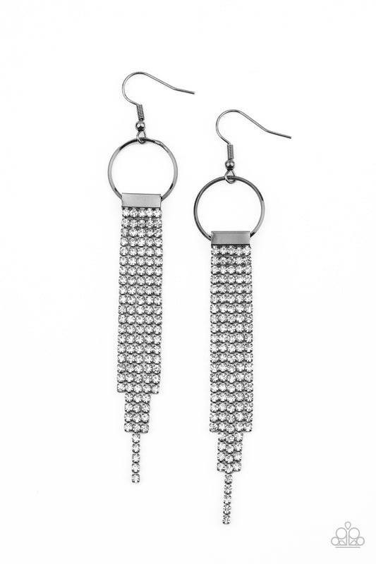 Dainty strands of glittery white rhinestones stream from the bottom of a gunmetal fitting that glides along the bottom of a dainty gunmetal hoop, creating a timelessly tapered fringe. Earring attaches to a standard fishhook fitting.