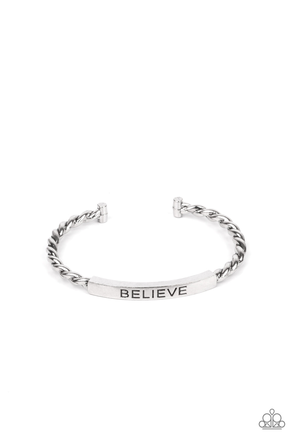 Twisted silver bars attach to a shiny silver plate stamped in the word, "BELIEVE," creating an inspiring cuff around the wrist.