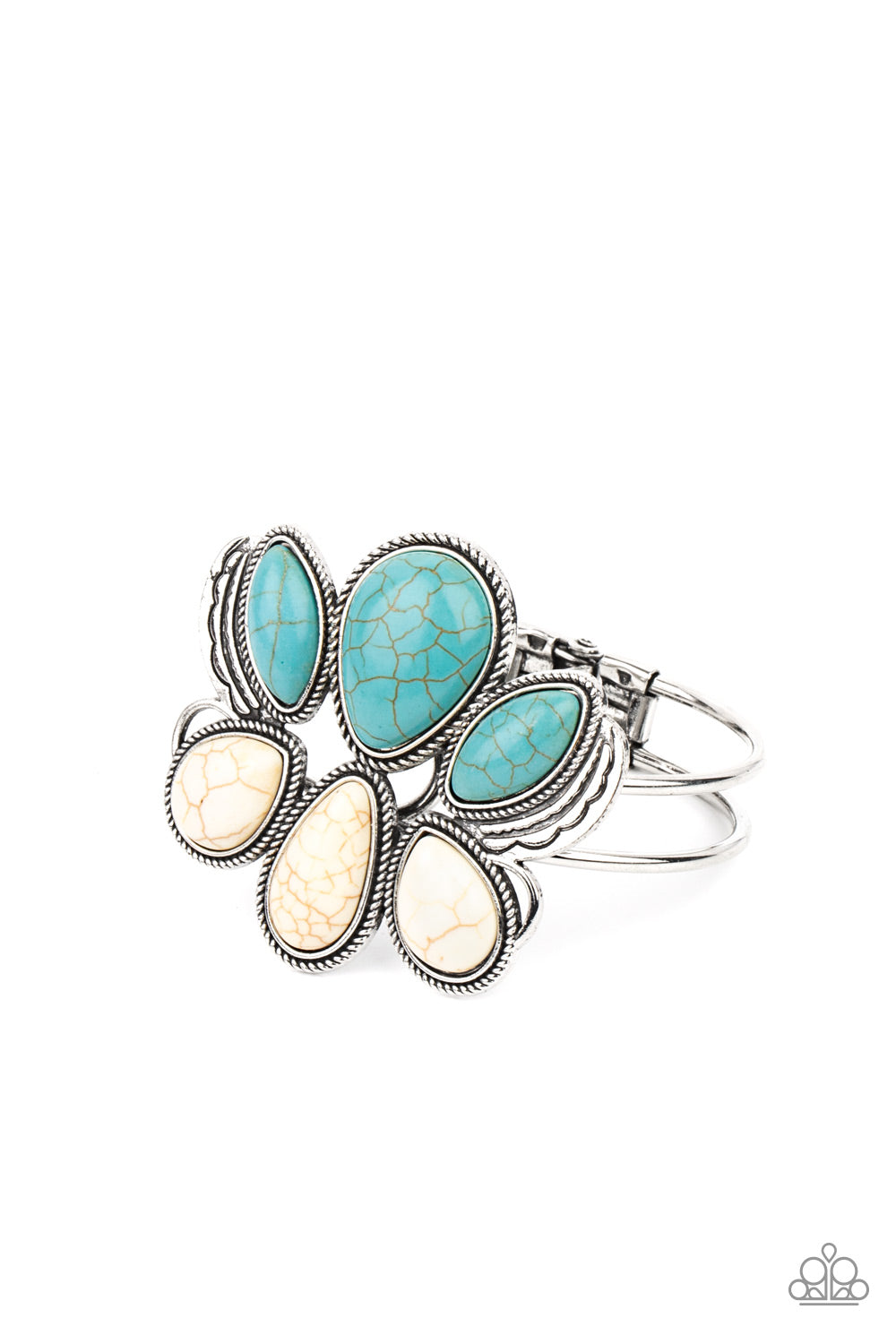 Encased in rope-like silver accents, a series of oversized oval and teardrop turquoise and white stone frames stack into a lotus-like floral frame atop a layered silver cuff. Features a hinged closure.