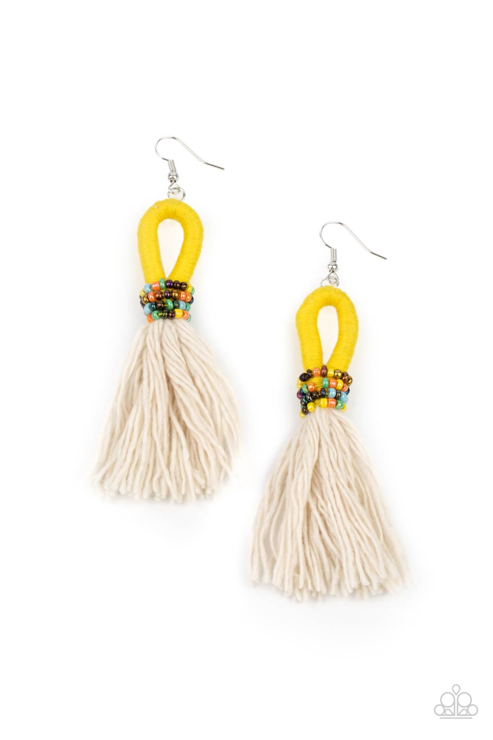 A tassel of soft white cotton fans out under rows of brightly colored seed beads. Anchored by a loop of vibrant yellow floss, the eye-catching style swings from the ear for a show-stopping statement. Earring attaches to a standard fishhook fitting.