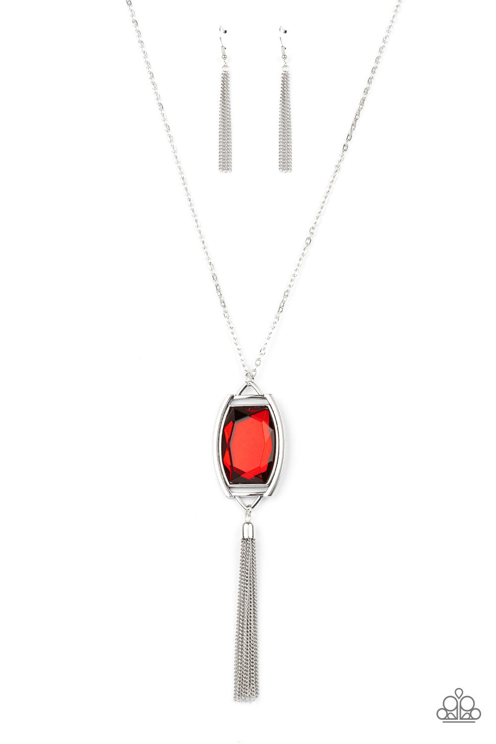 Encased in an antiqued silver frame, an oversized red gem swings from the bottom of an ornate silver chain. A shimmery silver chain tassel swings from the bottom of the sparkly pendant, creating a regal talisman. Features an adjustable clasp closure.