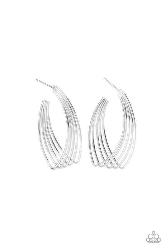 A shiny collection of dainty silver wires twist and layer into a hook shaped frame, creating an edgy illusion. Earring attaches to a standard post fitting. Hoop measures approximately 1" in diameter.