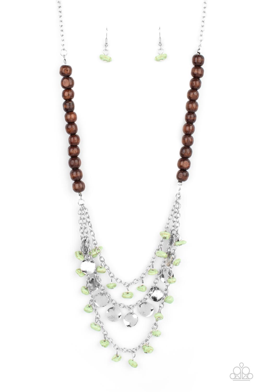 Adorned with green pebbles and hammered silver discs, three silver chains layer from strands of brown wooden beads, creating an earthy fringe below the collar. Features an adjustable clasp closure.