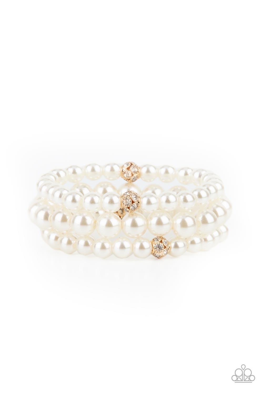 Infused with white rhinestone encrusted gold beads, a bubbly collection of mismatched white pearls are threaded along stretchy bands around the wrist for a vintage inspired layered look.