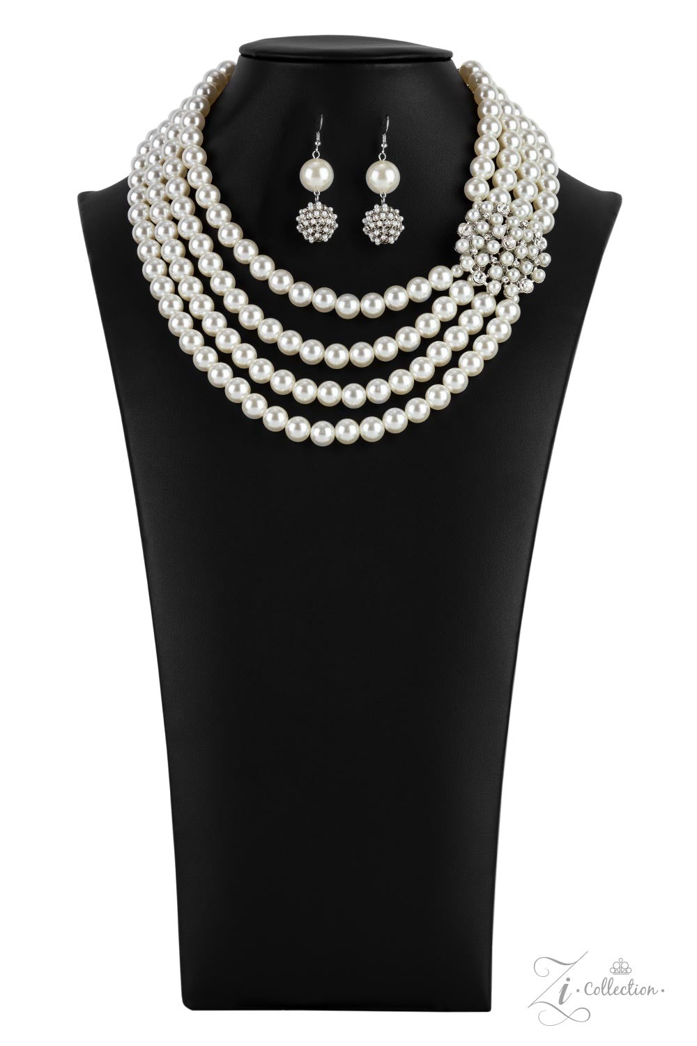 Inspired by royalty, an elegant explosion of classic white rhinestones and timeless pearls delicately coalesces into a vintage brooch. The refined ornament delicately holds together strands of oversized pearls, creating romantically regal layers below the collar. Features an adjustable clasp closure.