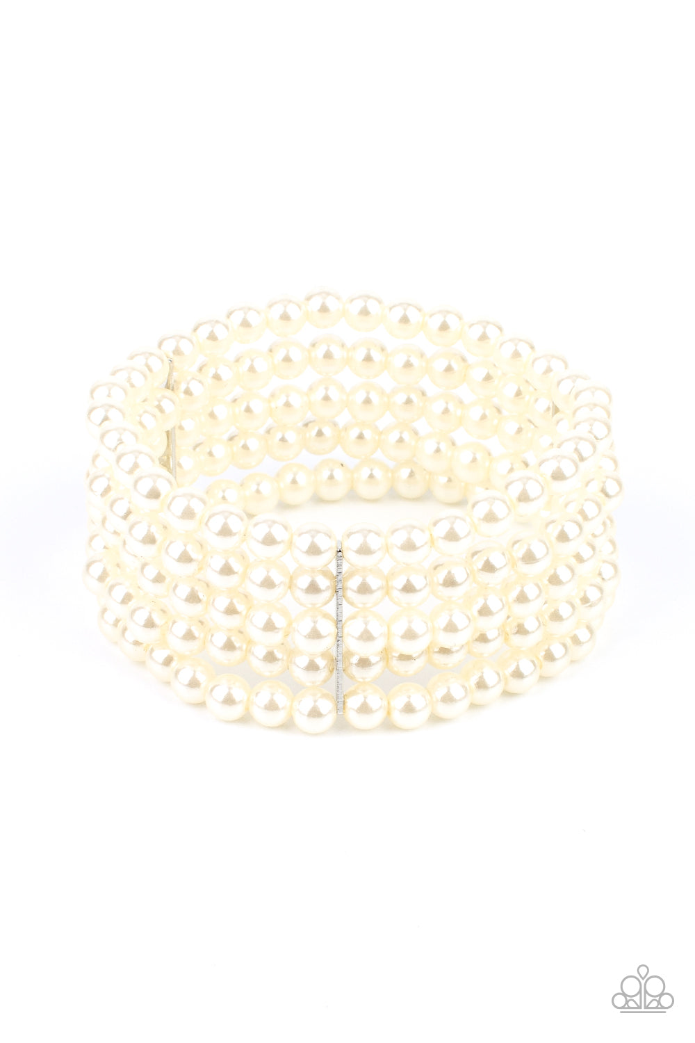 Stacked layers of luminous white pearl-like beads are threaded along stretchy bands creating a subtly indulgent allure around the wrist.