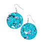 Featuring a colorful terrazzo finish, a faux blue stone disc swings from the ear for a modern look. Earring attaches to a standard fishhook fitting.