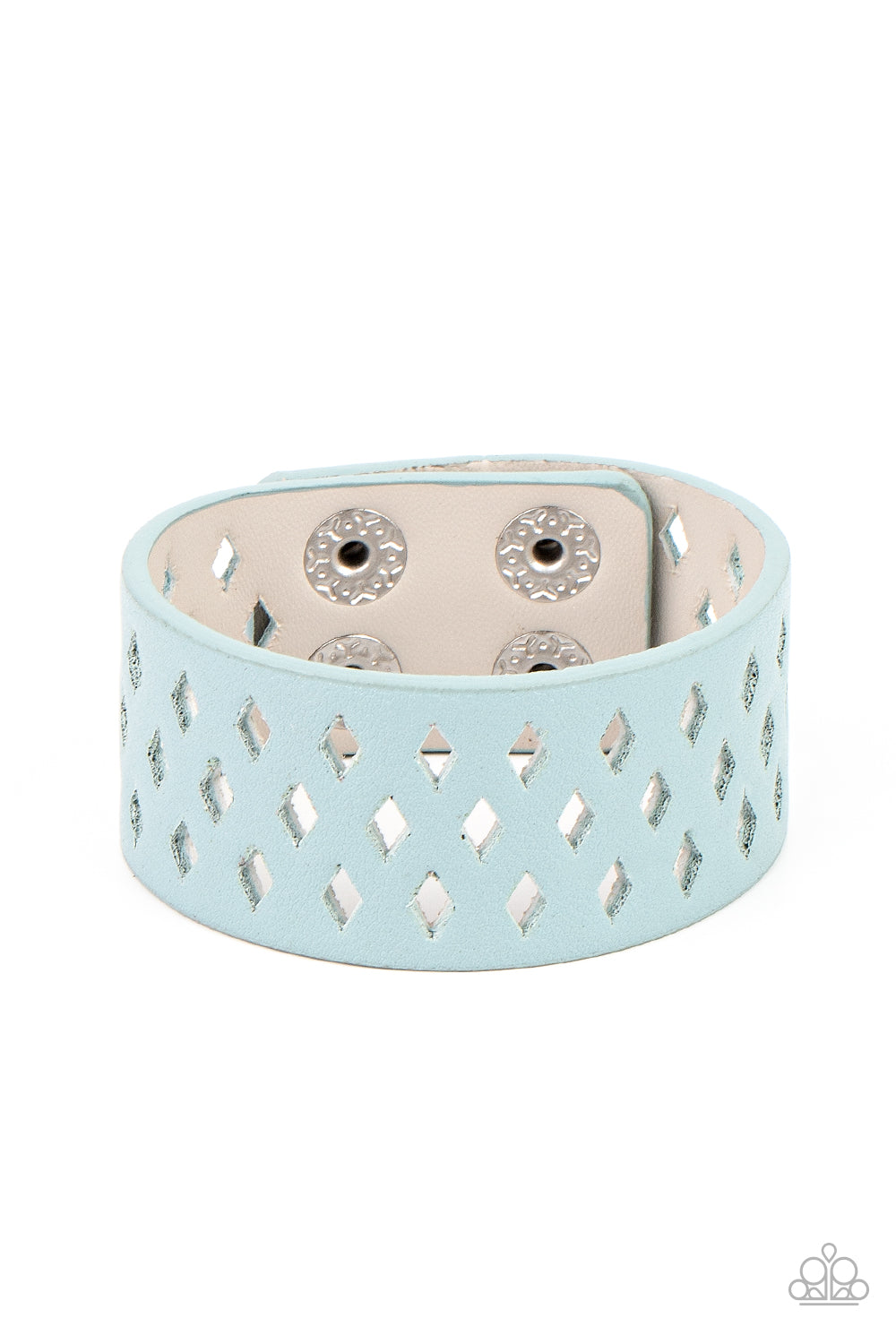 A wide blue leather band is filled with patterned rows of small diamond-shaped cutouts giving the illusion of diamonds floating across the wrist in a whimsical fashion. Features an adjustable snap closure.