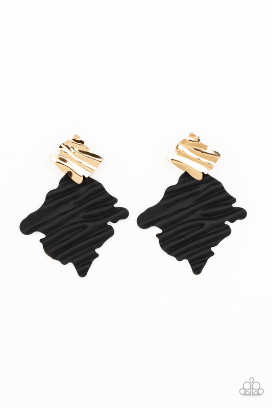 Painted in a matte finish, a rippling black frame links to a dainty gold frame featuring crimped texture, resulting in a modern lure. Earring attaches to a standard post fitting.