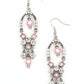 Glittery white rhinestones and pearly pink beaded fittings delicately swing from the bottom of an ornately embellished oval frame. A matching pearly frame dangles from the top of the decorative silver frame, adding timeless movement to the sparkly display. Earring attaches to a standard fishhook fitting.