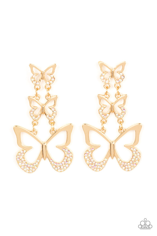 An airy trio of gold butterflies gradually increase in size as they link into a whimsical lure. The bottom of each butterfly has been dipped in iridescent rhinestones, adding a glitzy finish to the fluttering centerpiece. Earring attaches to a standard fishhook fitting.