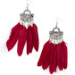 Oversized red feathers swing from the bottom of an ornately hammered and stacked silver frame, resulting in a flirtatiously colorful fringe. Earring attaches to a standard fishhook fitting.