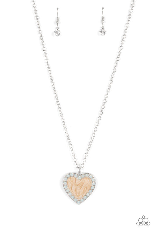 Bordered in a row of opal white rhinestones, a silver frame is painted in a glossy brown finish at the bottom of a silver chain for a flirtatious finish. Features an adjustable clasp closure.