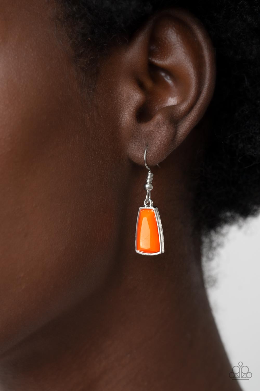 Encased in sleek silver fittings, a faceted assortment of teardrop, marquise, and emerald cut orange beads fan out below the collar for a bold pop of color. Features an adjustable clasp closure.  Sold as one individual necklace. Includes one pair of matching earrings.