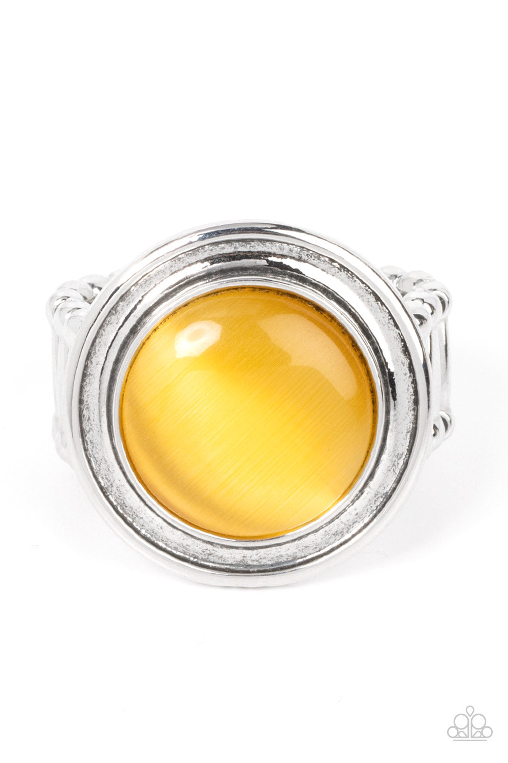 A yellow cat's eye stone is encircled in rippling silver frames, pooling into an ethereal pop of color atop the finger. Features a stretchy band for a flexible fit.