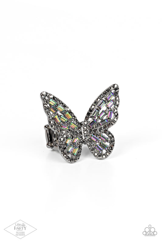 Dainty oil spill emerald-cut rhinestones are sprinkled across the gunmetal wings of a butterfly that is encrusted in dauntless hematite rhinestones for a dramatically dazzling finish. Features a stretchy band for a flexible fit.