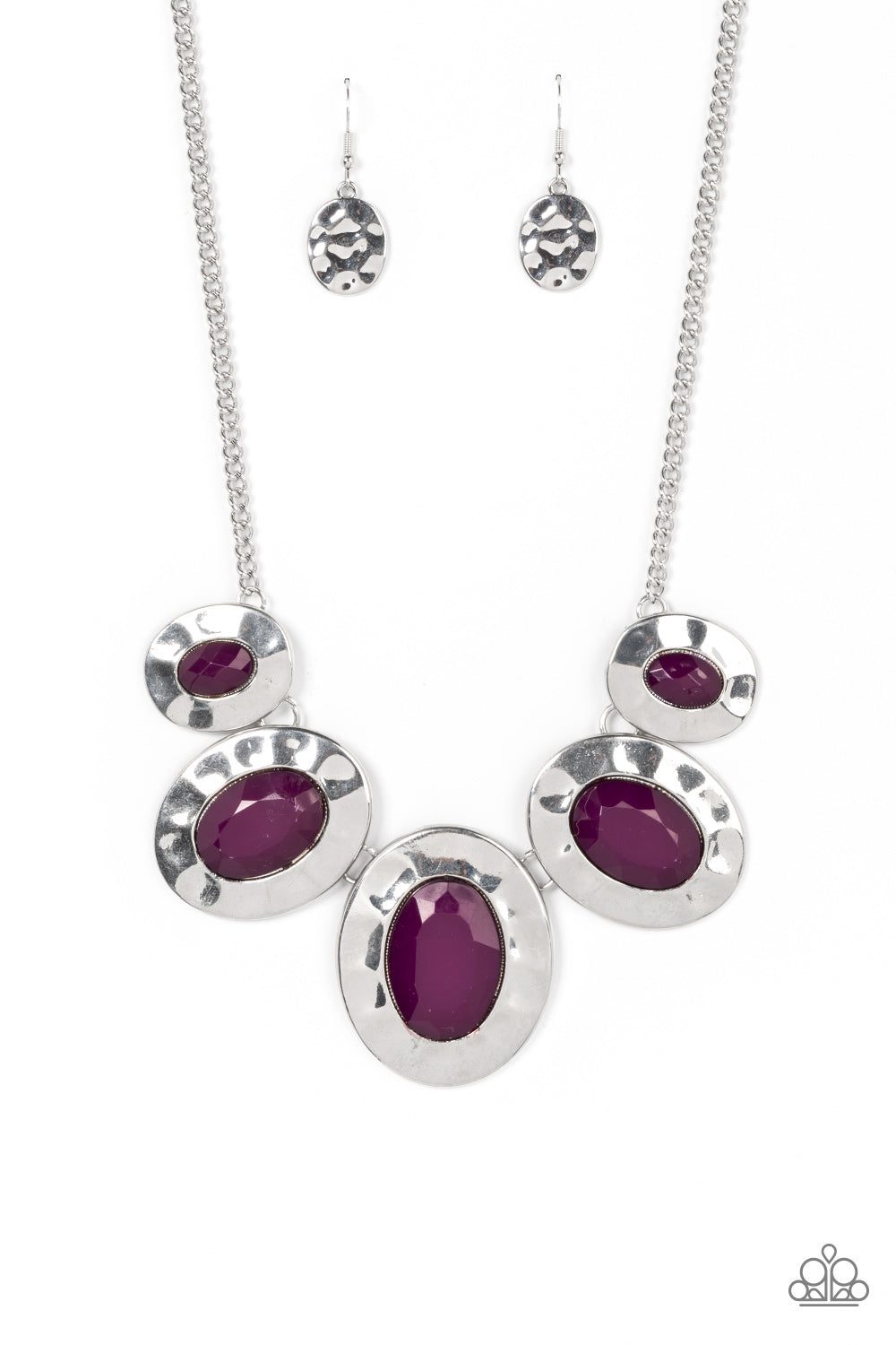 Gradually increasing in size, hammered silver oval frames are dotted with faceted plum beads as they delicately link below the collar for a vivacious pop of color. Features an adjustable clasp closure.  Sold as one individual necklace. Includes one pair of matching earrings.