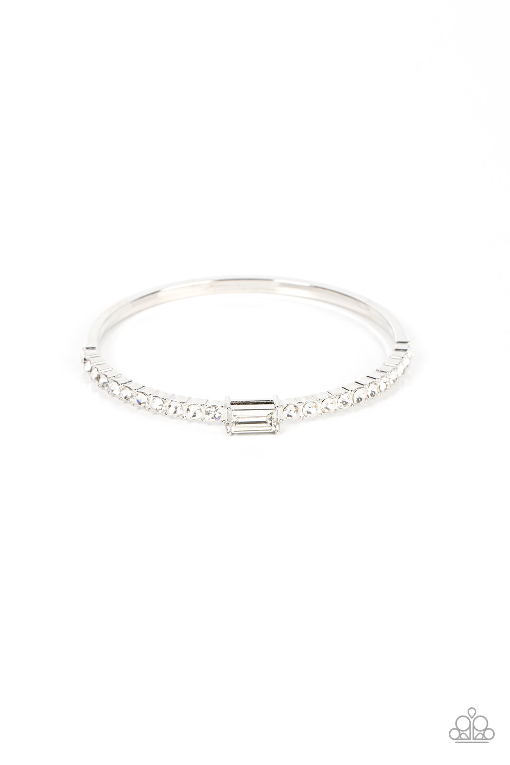 An emerald cut white rhinestone sparkles between a row of glassy white rhinestones across the front of a stunning silver bangle, resulting in a stackable and sparkly centerpiece.  Sold as one indivi
