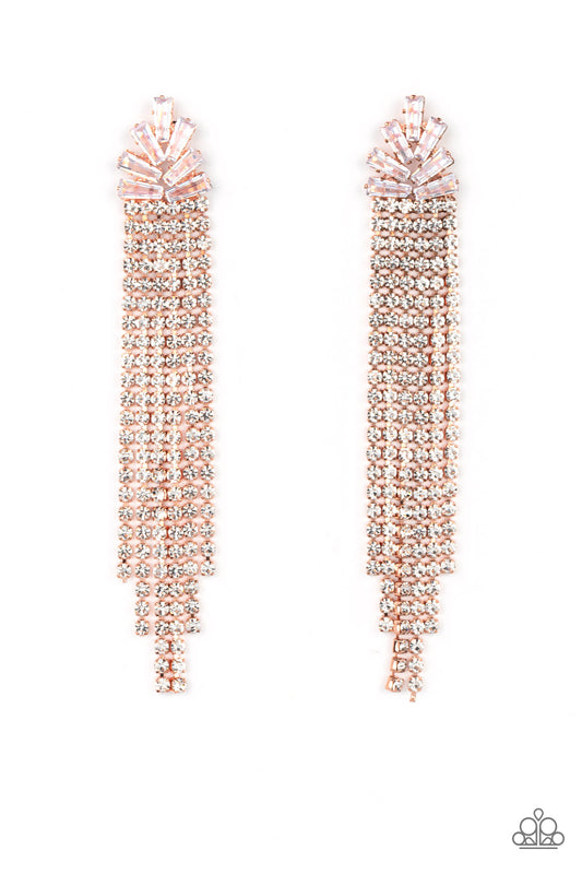 Sparkly strands of dainty white rhinestones stream out from the bottom of a shiny copper frame made up of a staggered collection of translucent and trapezoidal cut rhinestones, resulting in a timeless tassel. Earring attaches to a standard post fitting.