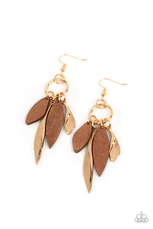 A mismatched collection of asymmetrical brown wooden frames and warped gold petals glide along a gold ring, resulting in an earthy tassel. Earring attaches to a standard fishhook fitting.