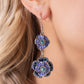 Dotted with dainty blue iridescent gem centers and navy rhinestone details, intricate 3D silver flowers, adorned in Persian Jewel shades, link into a whimsical, glitzy lure. Earring attaches to a standard fishhook fitting. Due to its prismatic palette, color may vary.